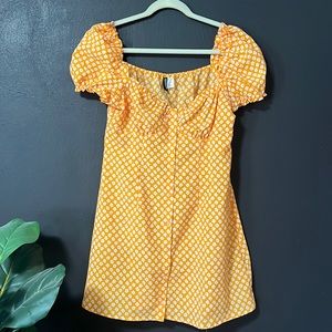 DIVIDED orange and white floral print dress. Size M